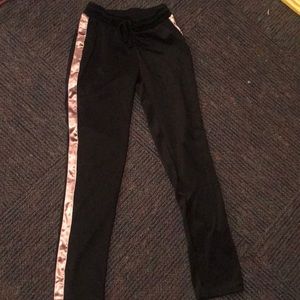 Black joggers with pink silk detail